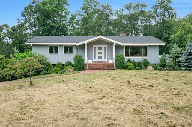 14 Perry Ct, Armonk, NY 10504 - ranch-style home with a chimney, a front yard, view of scattered trees, and a shingled roof