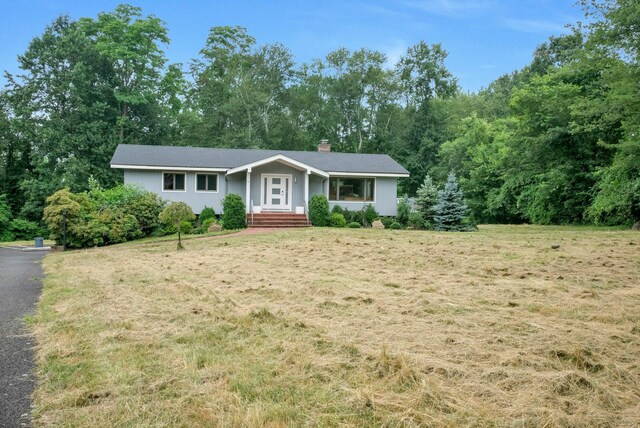 14 Perry Ct, Armonk, NY 10504 - single story home featuring a front yard and a chimney