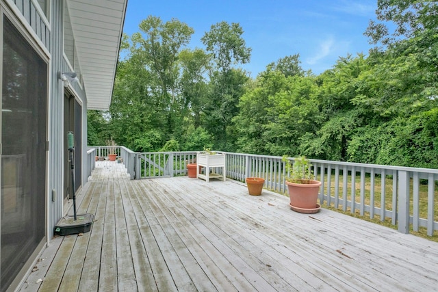 14 Perry Ct, Armonk, NY 10504 - wooden deck with view of scattered trees