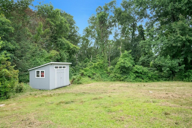 14 Perry Ct, Armonk, NY 10504 - view of green lawn with a storage shed