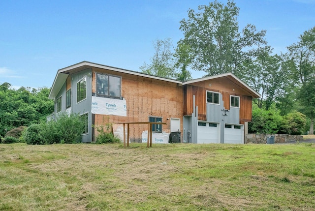 14 Perry Ct, Armonk, NY 10504 - view of property exterior with a garage and a yard