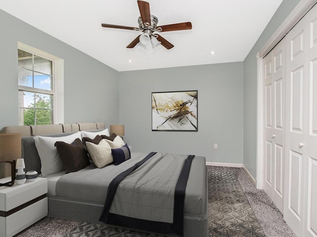 bedroom with a closet, ceiling fan, recessed lighting, baseboards, and carpet