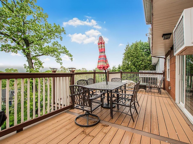deck featuring outdoor dining space