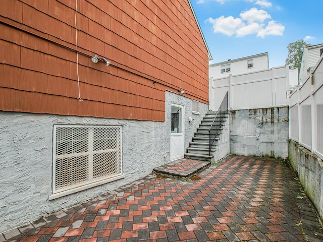 view of patio featuring stairs