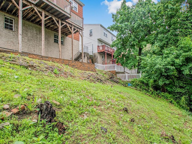 view of yard featuring a wooden deck