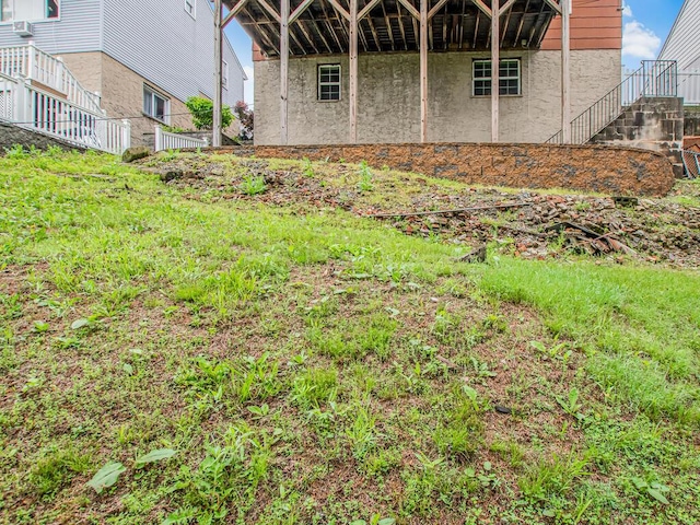 view of home's exterior with stairs