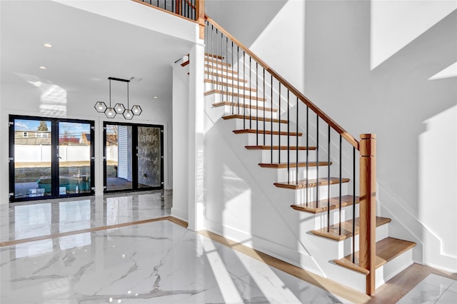 3585 Martha Blvd, Bethpage, NY 11714 - staircase with a high ceiling, marble finish floor, baseboards, and recessed lighting