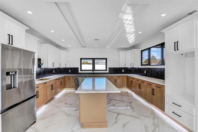 3585 Martha Blvd, Bethpage, NY 11714 - kitchen featuring marble finish floor, backsplash, a center island, and appliances with stainless steel finishes