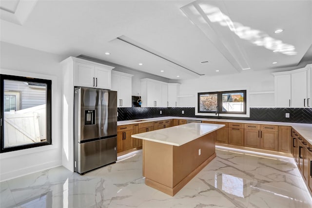 3585 Martha Blvd, Bethpage, NY 11714 - kitchen with marble finish floor, stainless steel fridge with ice dispenser, a kitchen island, and open shelves