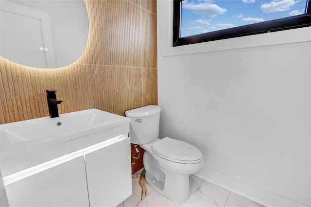 3585 Martha Blvd, Bethpage, NY 11714 - bathroom with marble finish floor, toilet, and vanity