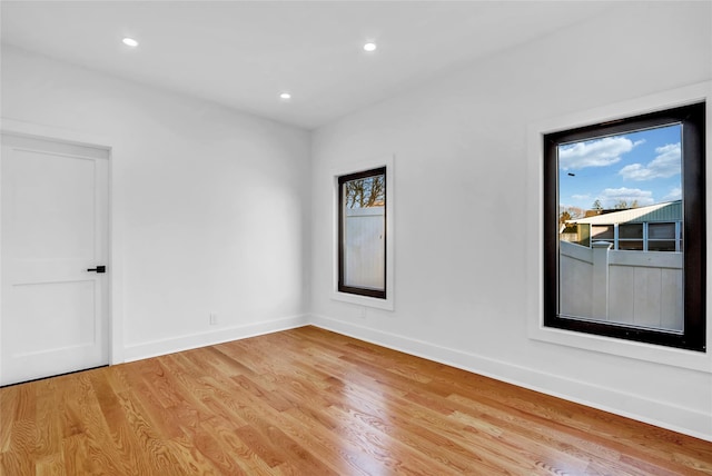 3585 Martha Blvd, Bethpage, NY 11714 - unfurnished room featuring baseboards, recessed lighting, and light wood finished floors