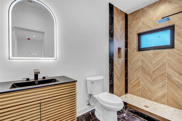 3585 Martha Blvd, Bethpage, NY 11714 - full bathroom featuring baseboards, marble finish floor, a tile shower, toilet, and vanity