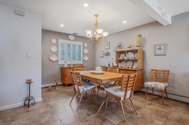 dining area with a baseboard heating unit, a chandelier, baseboards, and recessed lighting