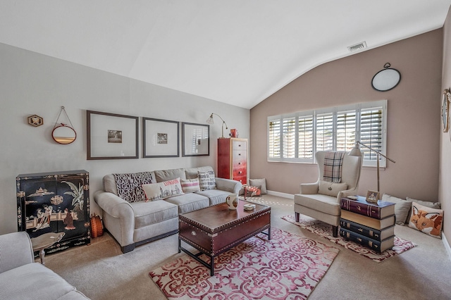 living room featuring vaulted ceiling, visible vents, and carpet flooring