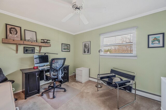 office space featuring crown molding, a baseboard heating unit, ceiling fan, carpet, and baseboards