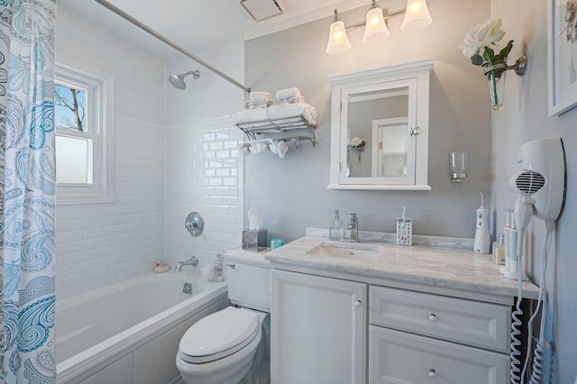 bathroom with toilet, vanity, and shower / bathtub combination with curtain