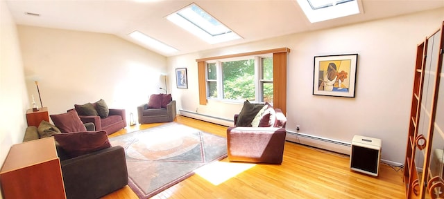 2 N Eckerson Ln, Spring Valley, NY 10977 - living room featuring baseboard heating, a skylight, light wood-type flooring, and lofted ceiling