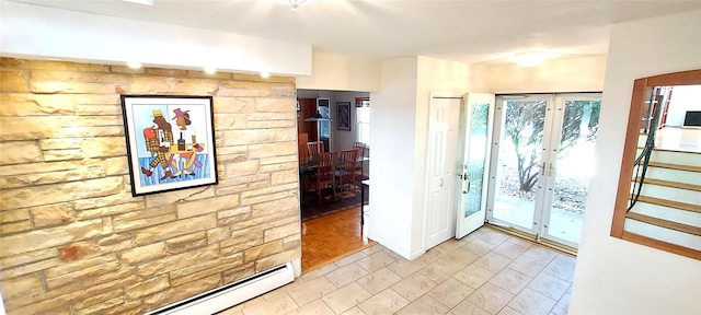 2 N Eckerson Ln, Spring Valley, NY 10977 - entryway featuring baseboard heating, french doors, and stairs