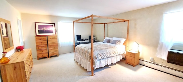 2 N Eckerson Ln, Spring Valley, NY 10977 - bedroom with baseboard heating and light carpet