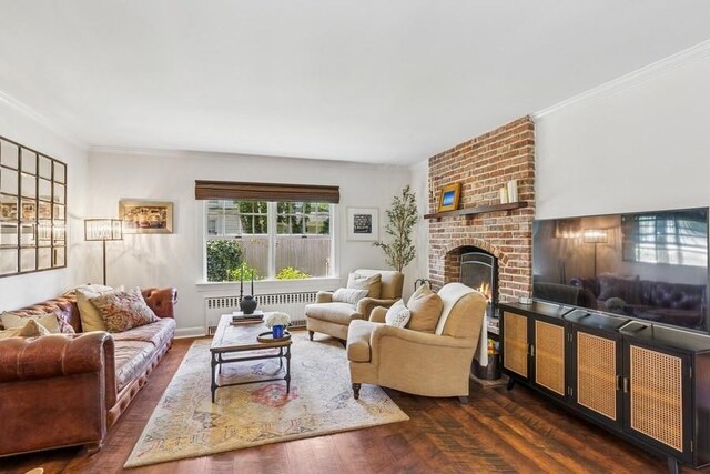 3320 Oregon Rd, Mattituck, NY 11952 - living room with radiator, dark wood finished floors, a fireplace, and ornamental molding
