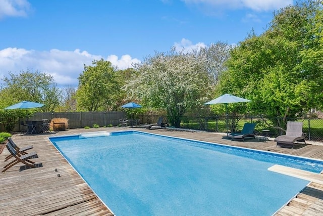 3320 Oregon Rd, Mattituck, NY 11952 - view of swimming pool featuring a fenced backyard, a diving board, and a deck