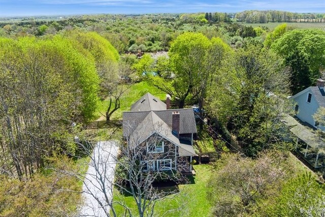 3320 Oregon Rd, Mattituck, NY 11952 - view of subject property with a forest