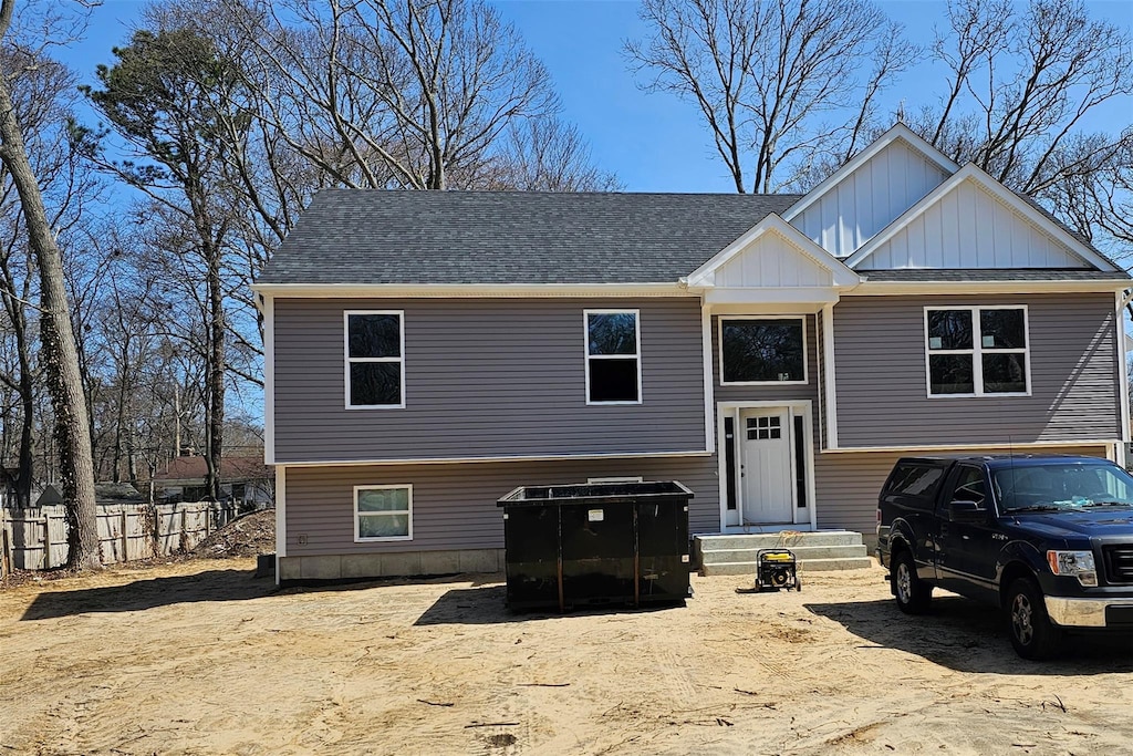 61 Margaret Dr, Coram, NY 11727 - split foyer home with board and batten siding and fence