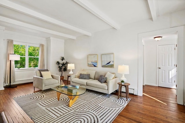 living room with baseboards, a baseboard heating unit, beam ceiling, and hardwood / wood-style flooring