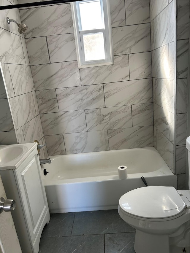 full bath featuring toilet, vanity, and shower / bathtub combination