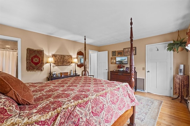bedroom with light wood-style flooring