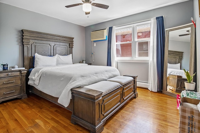 13506 62nd Rd, Flushing, NY 11367 - bedroom with wood finished floors, a ceiling fan, and a wall mounted air conditioner