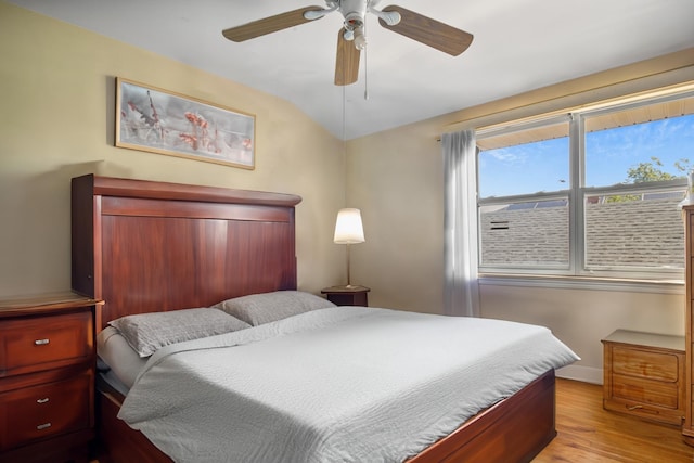 13506 62nd Rd, Flushing, NY 11367 - bedroom featuring light wood-style floors, vaulted ceiling, baseboards, and ceiling fan