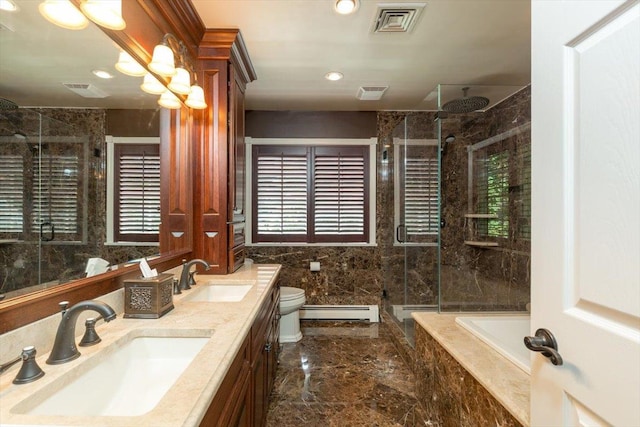 bathroom featuring a baseboard radiator, marble finish floor, a sink, and visible vents