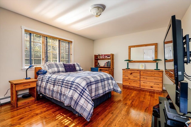 bedroom featuring wood finished floors