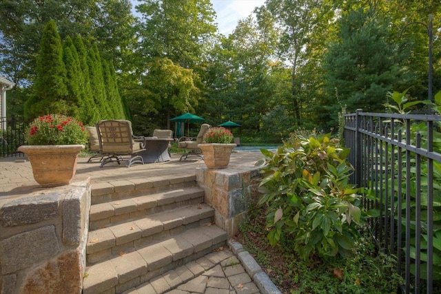 view of patio / terrace with fence
