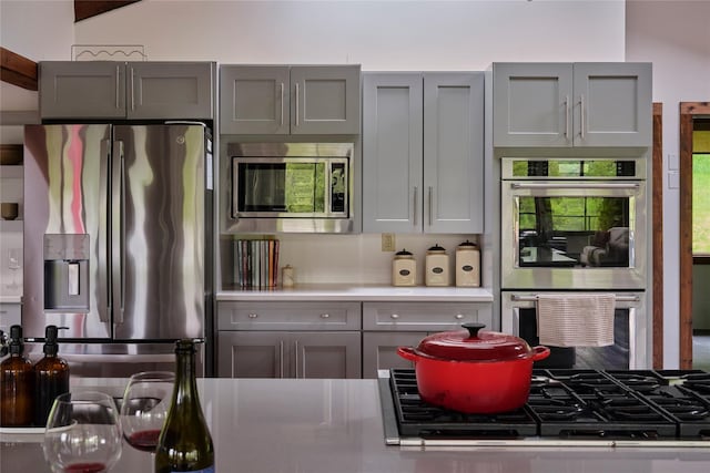 65 Deuner Hill Rd, Callicoon Center, NY 12723 - kitchen with stainless steel appliances, gray cabinets, and light countertops