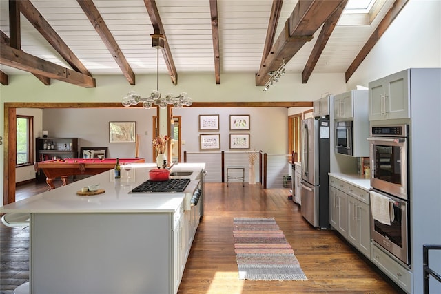 65 Deuner Hill Rd, Callicoon Center, NY 12723 - kitchen featuring stainless steel appliances, gray cabinets, light countertops, a large island with sink, and dark wood-style flooring