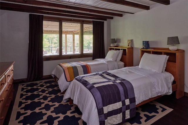 65 Deuner Hill Rd, Callicoon Center, NY 12723 - bedroom featuring beam ceiling, wood finished floors, and baseboards