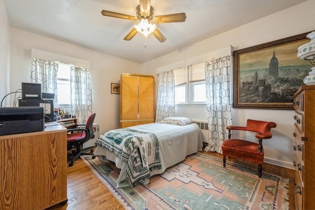260 Washington Ave, Harbor Isle, NY 11558 - bedroom featuring a ceiling fan and light wood-style floors