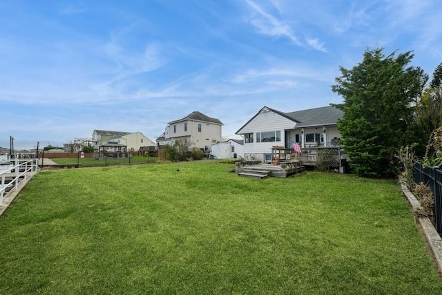 260 Washington Ave, Harbor Isle, NY 11558 - view of yard featuring a wooden deck and a fenced backyard