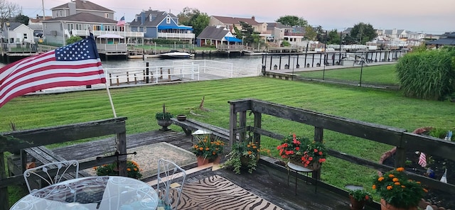 260 Washington Ave, Harbor Isle, NY 11558 - view of property's community with a lawn, a water view, a boat dock, and a residential view