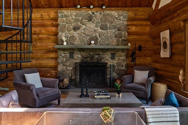 649 County Road 95, North Branch, NY 12766 - living room featuring wooden ceiling, log walls, a fireplace, and stairway