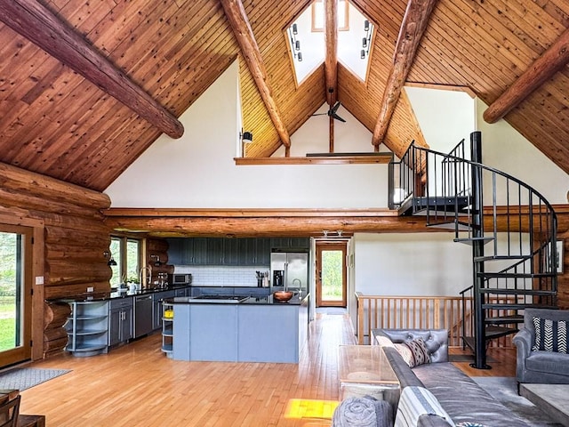 649 County Road 95, North Branch, NY 12766 - unfurnished living room featuring high vaulted ceiling, light wood-style floors, log walls, a wooden ceiling with exposed beams, and stairs