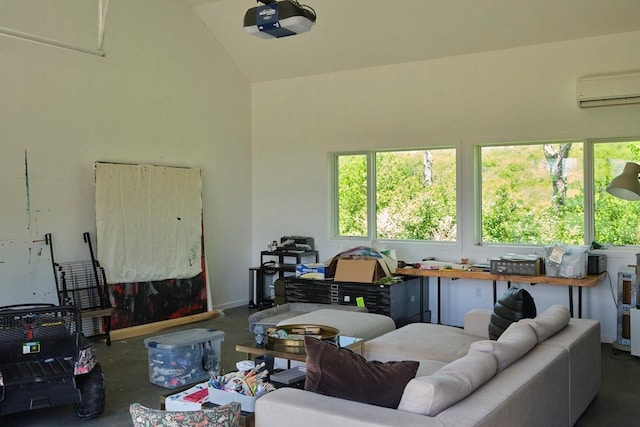 649 County Road 95, North Branch, NY 12766 - living room with concrete flooring, a wall unit AC, plenty of natural light, and a high ceiling