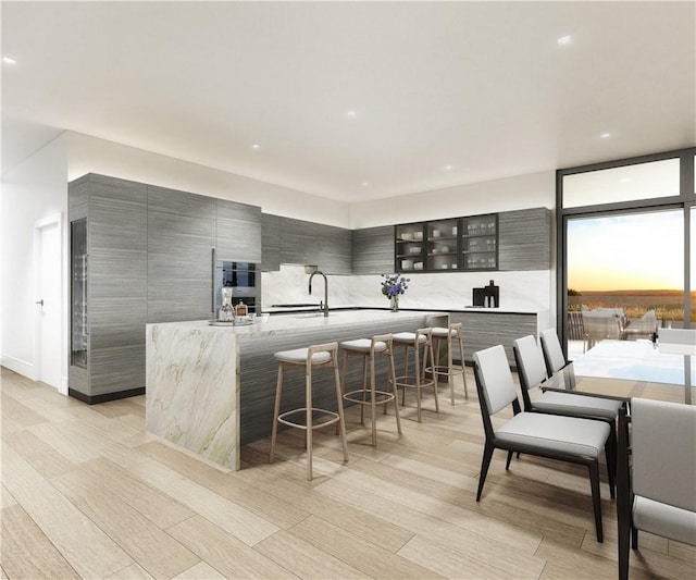 570 Bedford Rd Unit 6-1C, Armonk, NY 10504 - kitchen featuring light countertops, modern cabinets, and gray cabinets