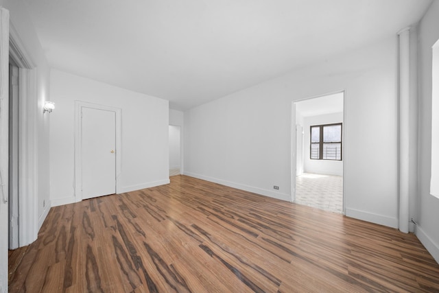 1001 Anderson Ave Unit 22, Bronx, NY 10452 - unfurnished bedroom featuring wood finished floors and baseboards