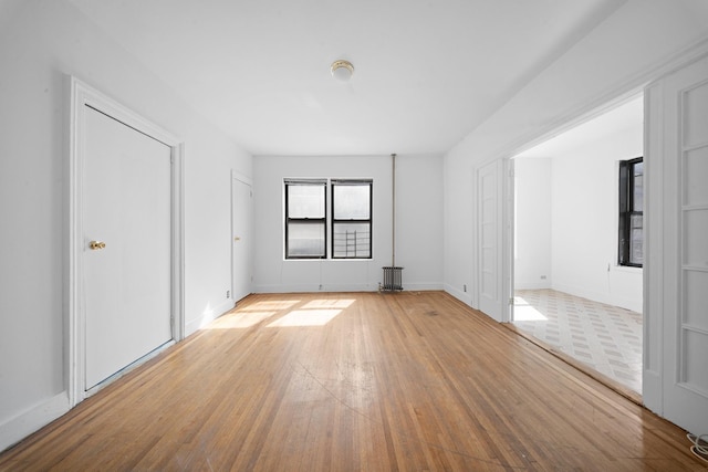 1001 Anderson Ave Unit 22, Bronx, NY 10452 - unfurnished bedroom with light wood finished floors and baseboards