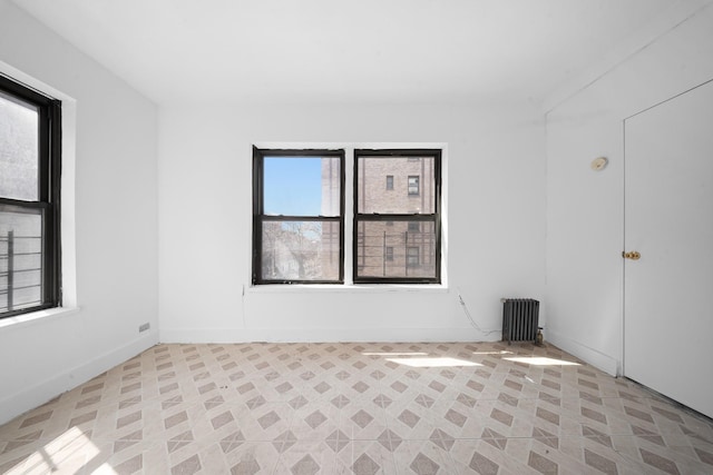 1001 Anderson Ave Unit 22, Bronx, NY 10452 - spare room featuring radiator