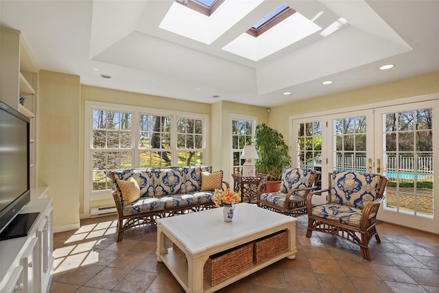 sunroom / solarium with french doors and a skylight
