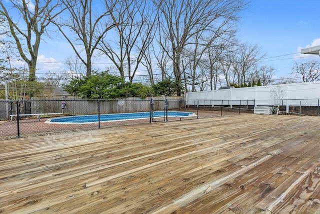 view of swimming pool with fence and a fenced in pool